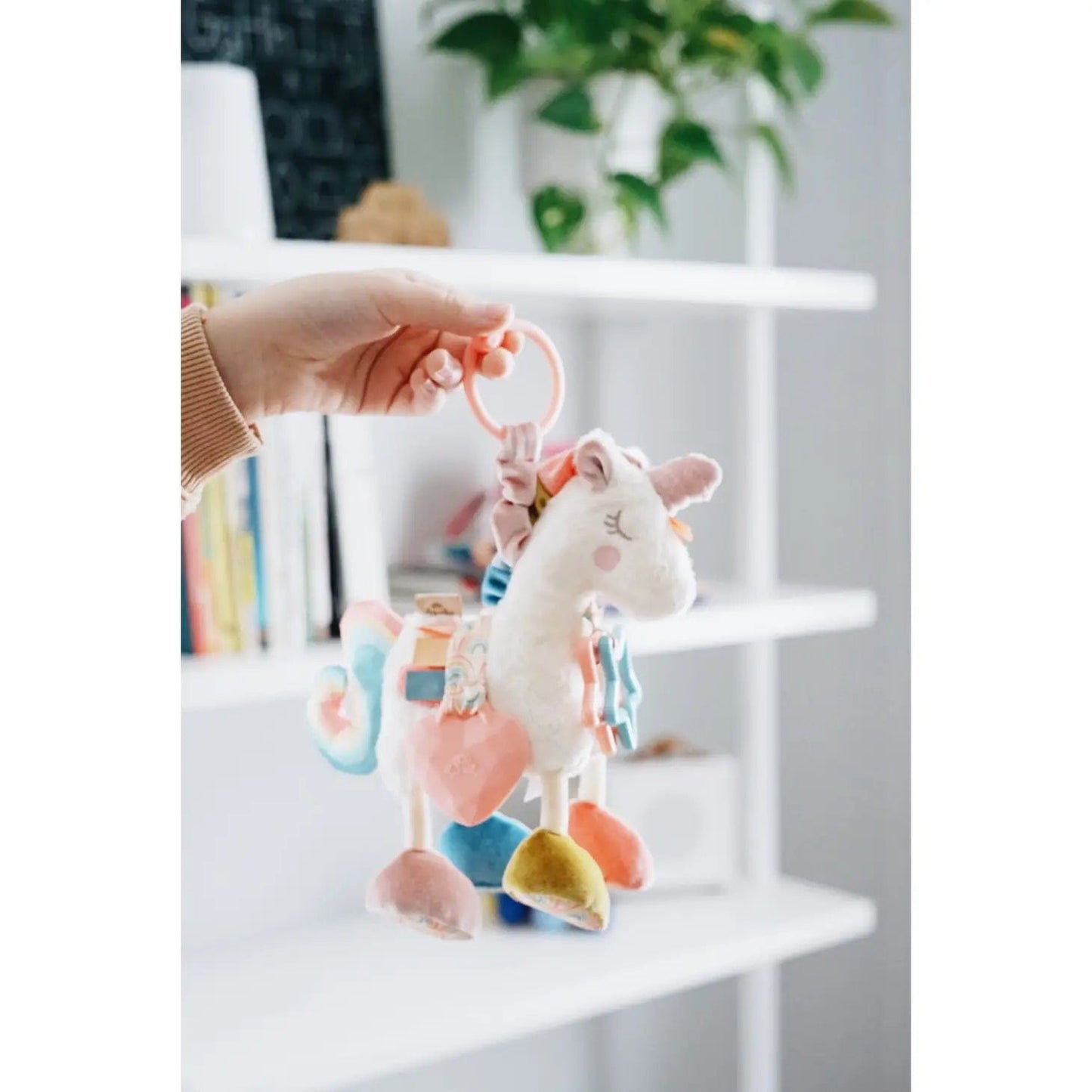 Link & Love™ Unicornio Actividad Peluche POS